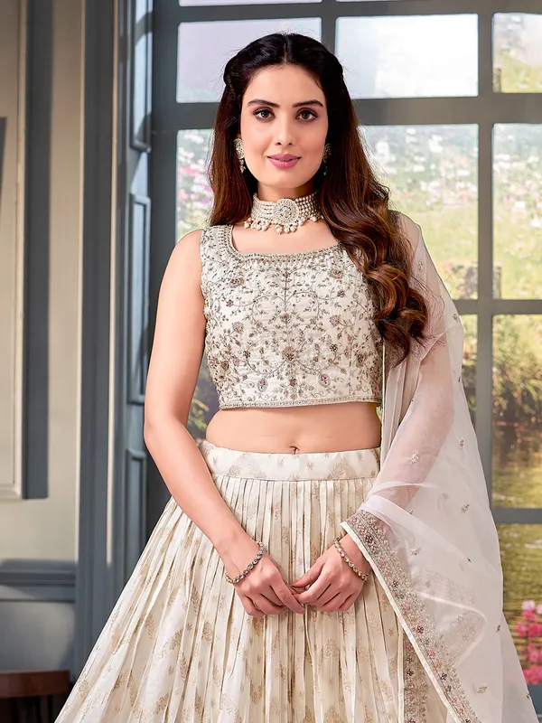 Trendy off-white lehenga choli with dupatta
