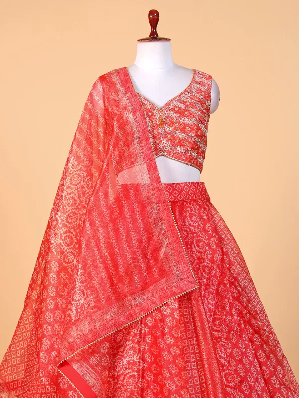 Trendy orange organza lehenga choli with dupatta