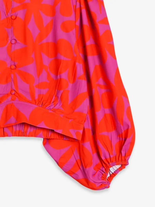 Trendy orange printed crop top
