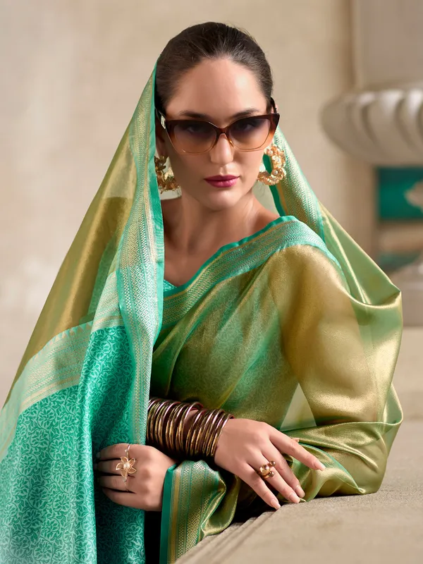 Trendy pastel green saree for festive