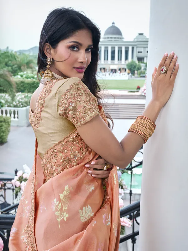 Trendy peach tissue silk saree for festive