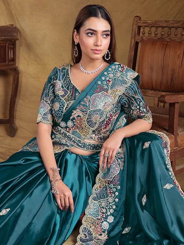 Trendy peacock blue satin silk saree