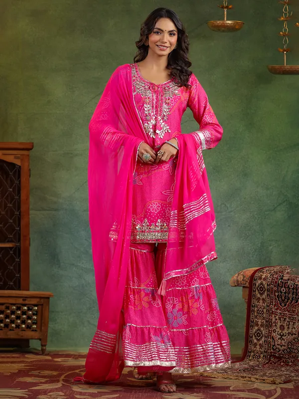 Trendy rani color silk sharara kurti set