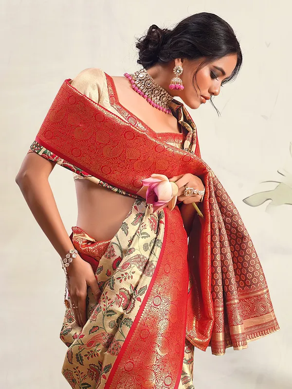 Trendy silk cream saree for festive
