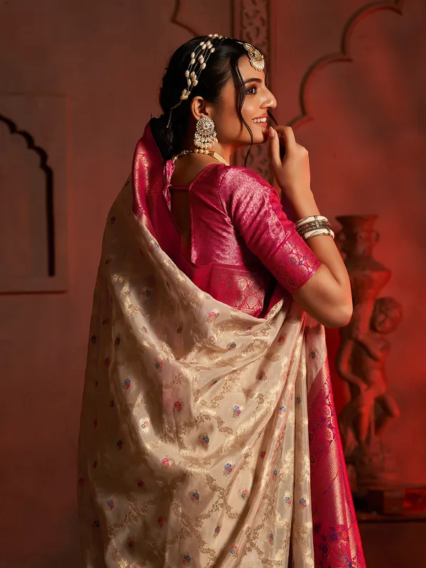 Trendy silk cream wedding wear saree