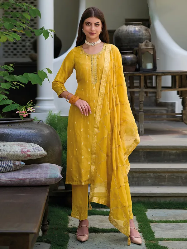 Trendy silk salwar suit in yellow