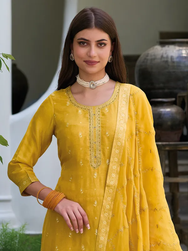 Trendy silk salwar suit in yellow