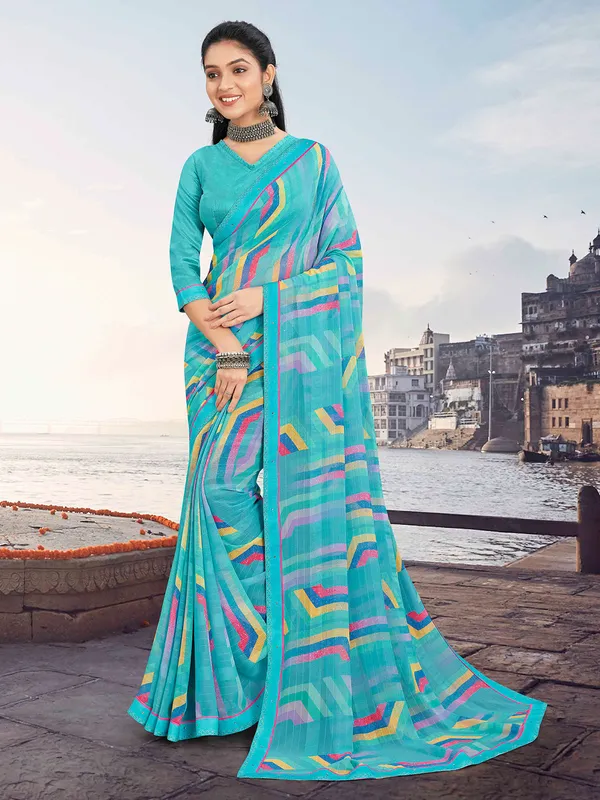 Trendy sky blue georgette saree