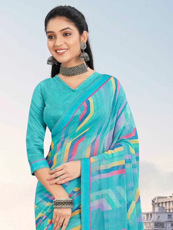 Trendy sky blue georgette saree
