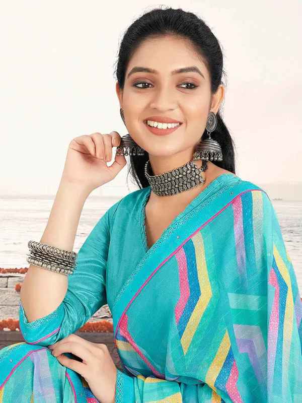Trendy sky blue georgette saree