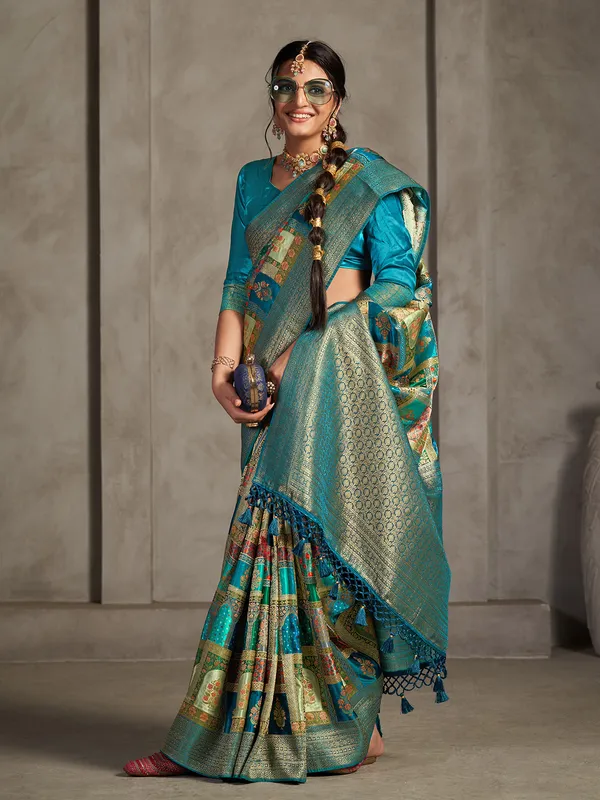 Turquoise blue printed zari woven saree