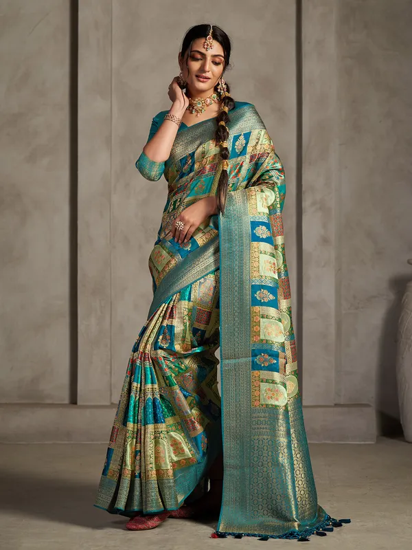 Turquoise blue printed zari woven saree