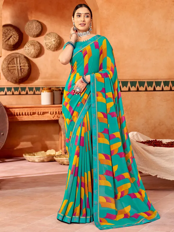 Turquoise green georgette printed saree
