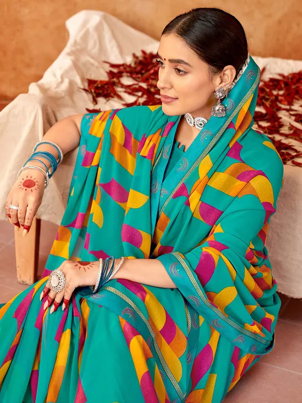Turquoise green georgette printed saree