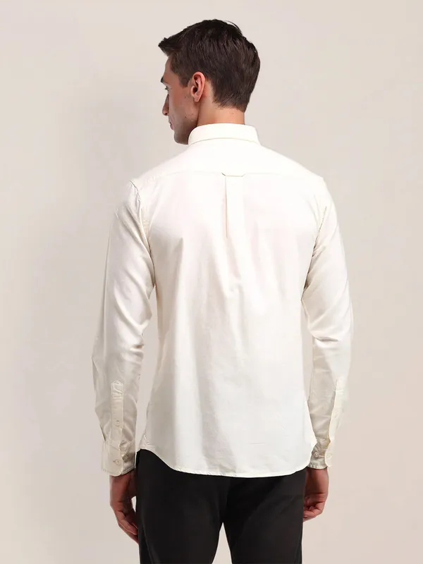 U S POLO ASSN cream plain shirt in cotton fabric