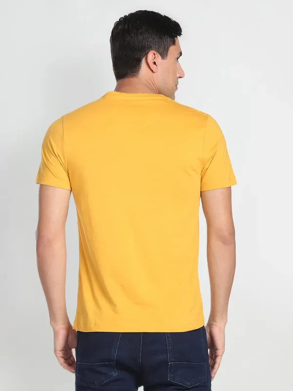 U S POLO ASSN dark yellow printed cotton t shirt