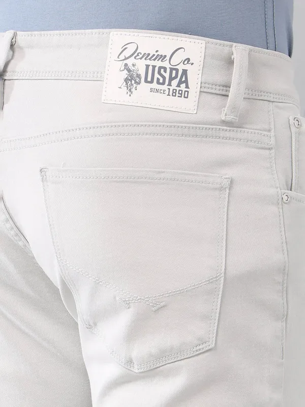 U S POLO solid grey slim tapered fit denim jeans