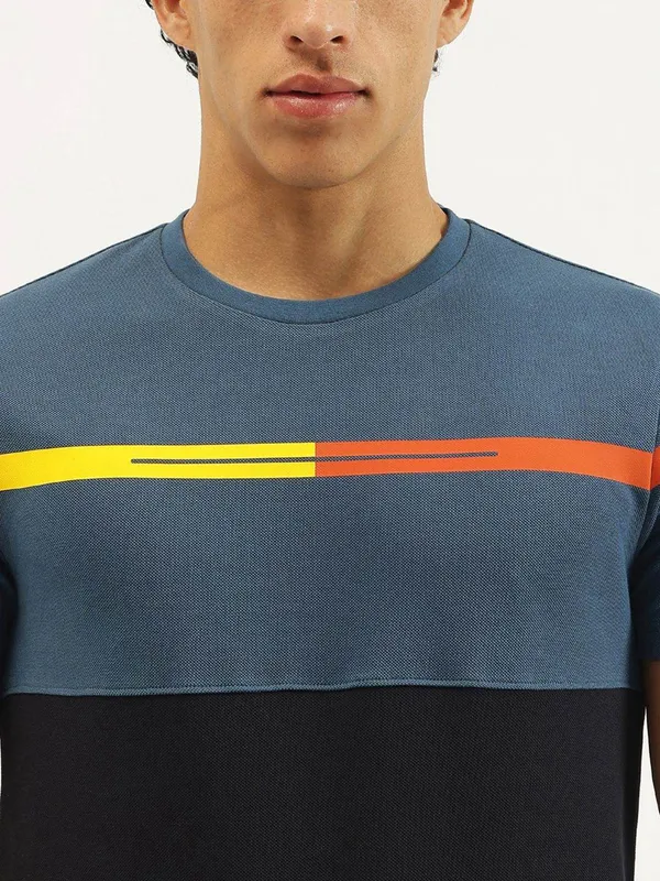 UCB black and teal blue round neck t-shirt