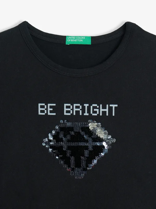 UCB black knitted top