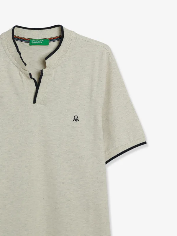 UCB cotton cream t shirt