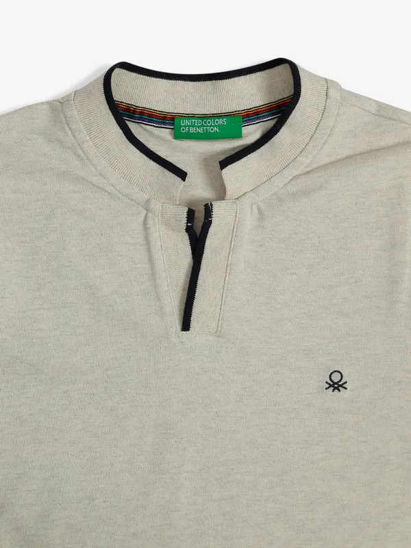 UCB cotton cream t shirt
