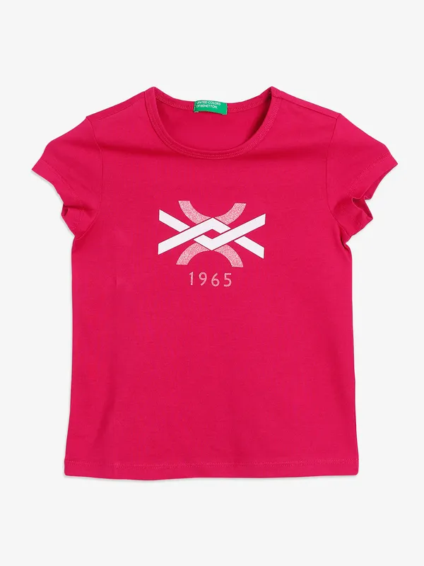 UCB cotton magenta top