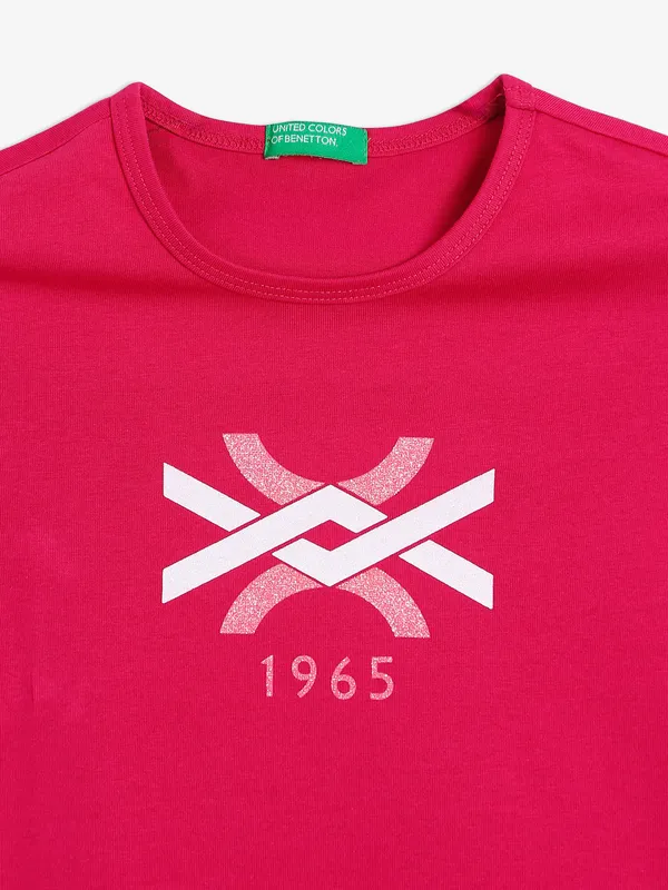 UCB cotton magenta top