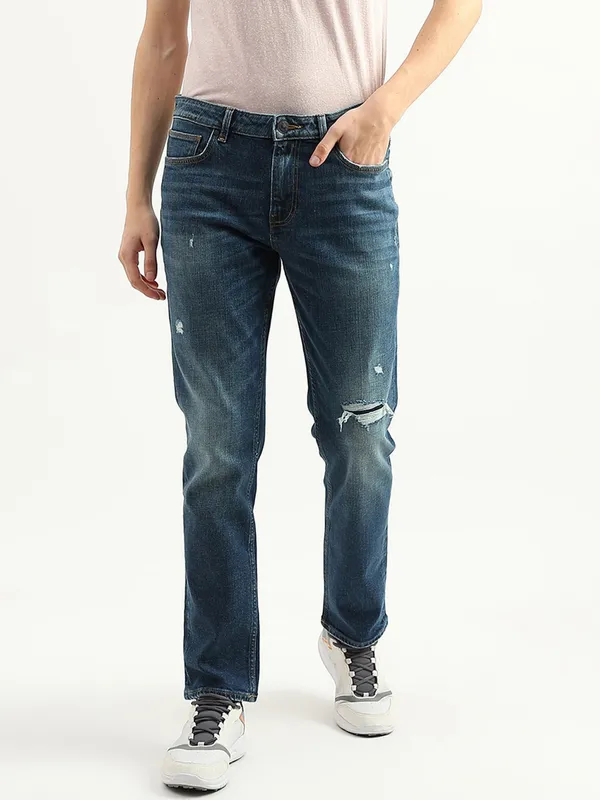 UCB dark blue ripped jeans