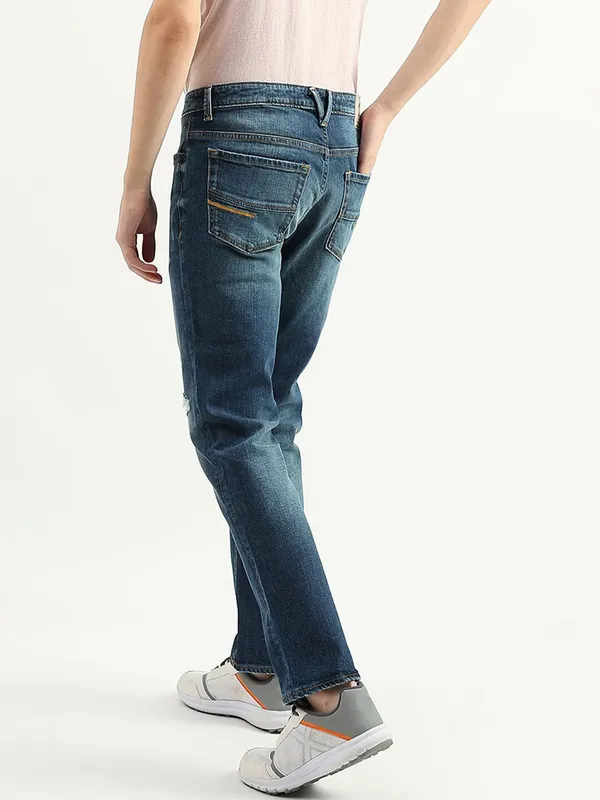 UCB dark blue ripped jeans