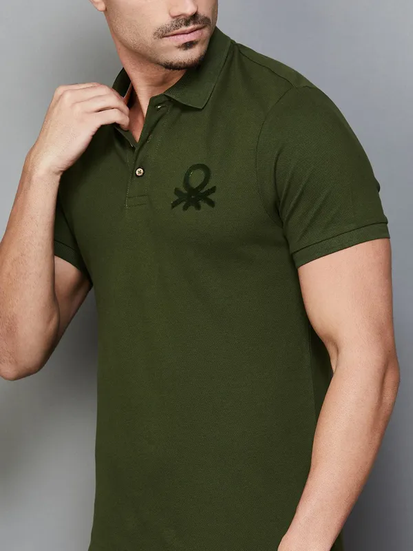 UCB dark olive polo t-shirt