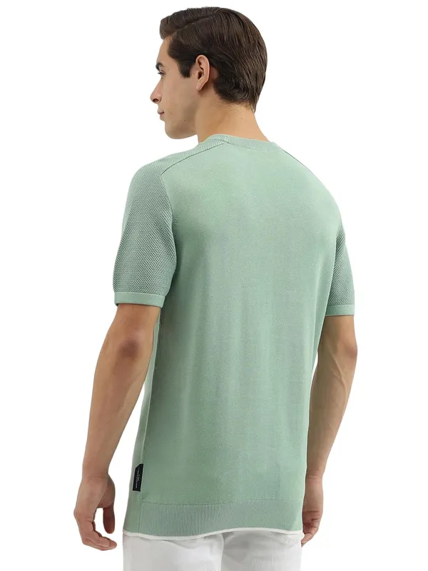 UCB green knitted sweatshirt
