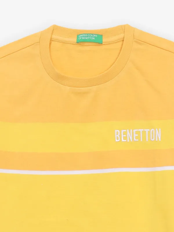 UCB mustard yellow stripe t-shirt