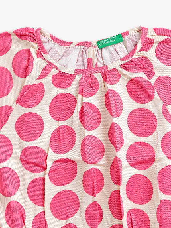 UCB off white and pink printed top