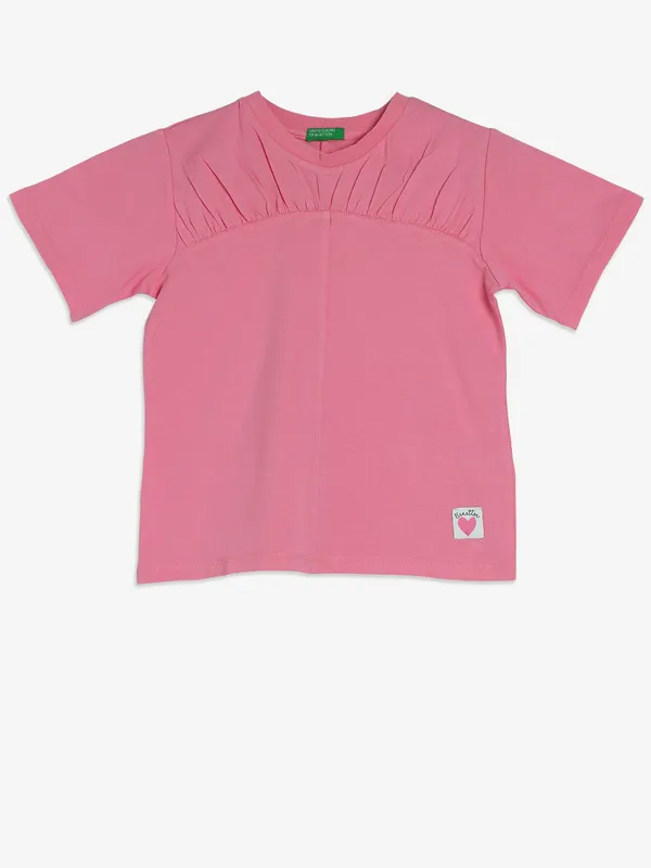 UCB pink plain top