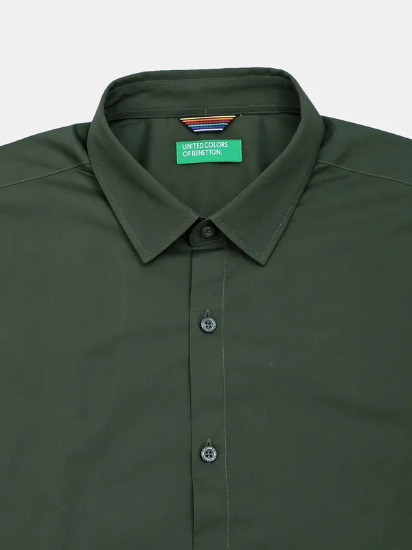 UCB plain dark green casual slim fit shirt