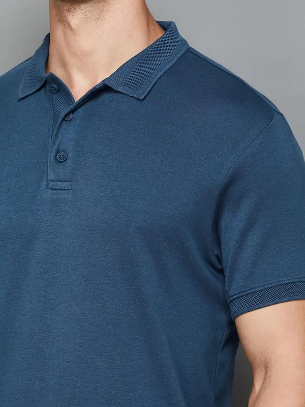 UCB plain prussian blue polo t shirt