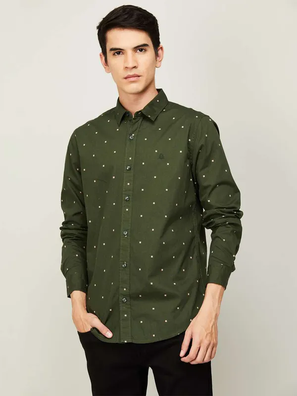 UCB printed style dark green tint shirt