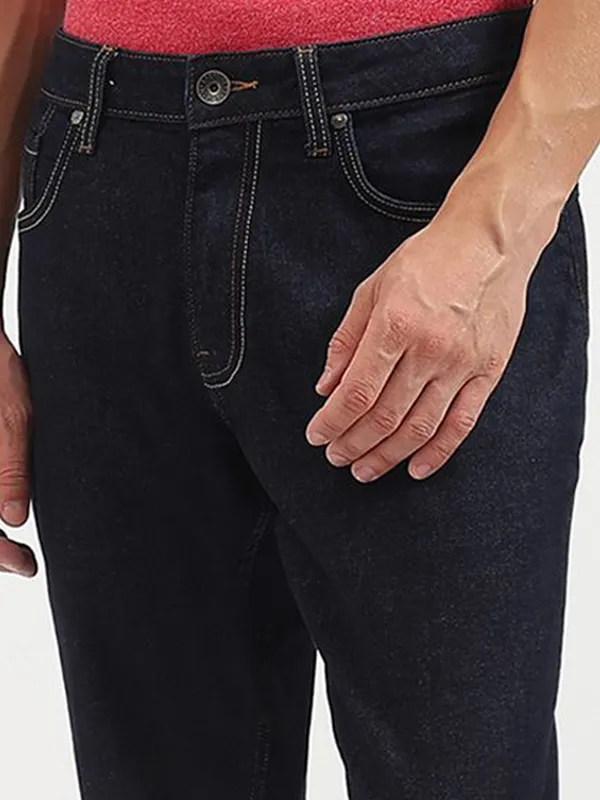 UCB solid black slim tapered denim jeans