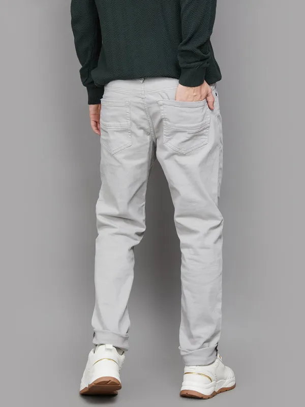 UCB solid light grey slim tapered fit denim jeans