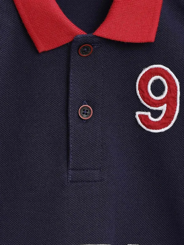 UCB printed navy hued boys t-shirt