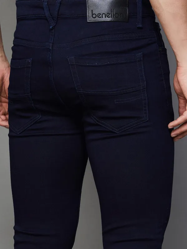 UCB solid navy slim tapered fit denim jeans for men