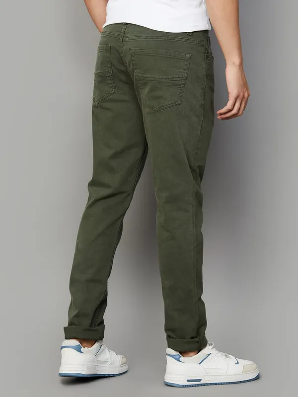 UCB solid olive slim tapered fit denim jeans