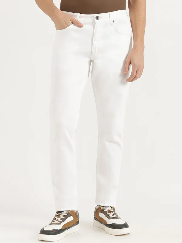 UCB solid white slim tapered fit denim jeans