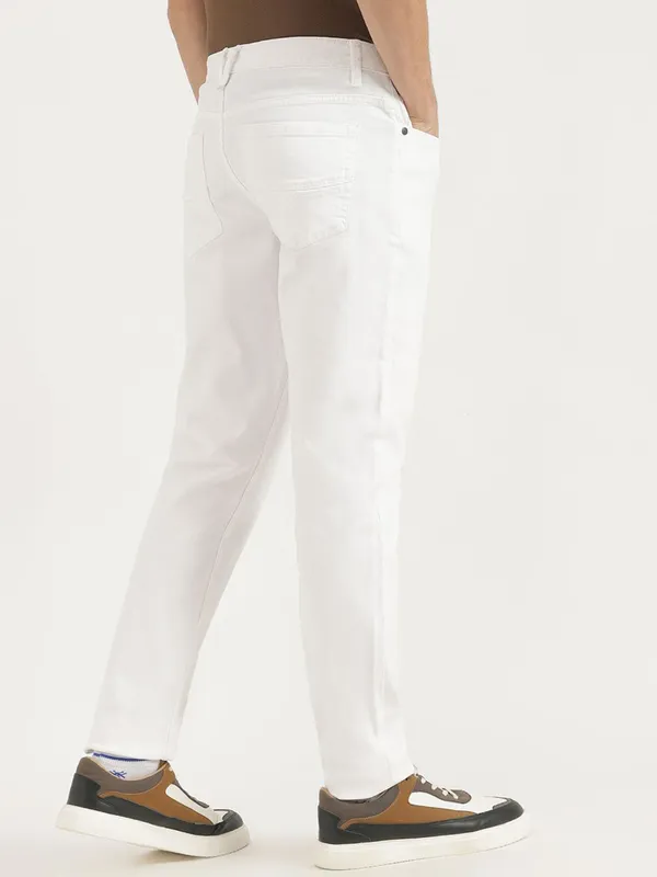 UCB solid white slim tapered fit denim jeans