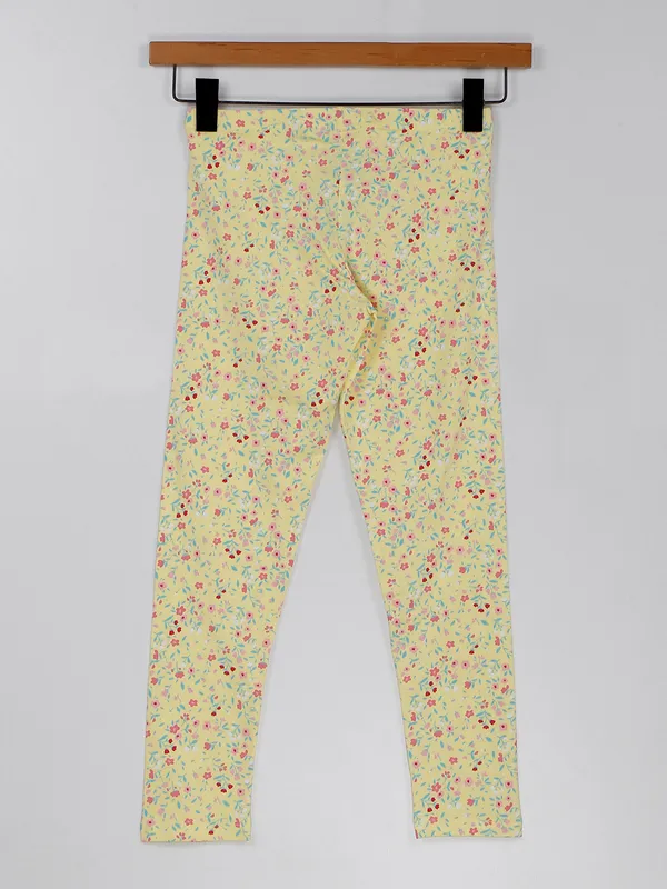 UCB trendy light yellow printed jeggings