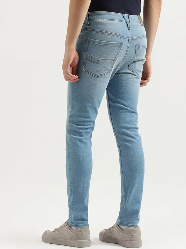 UCB washed blue denim jeans for men