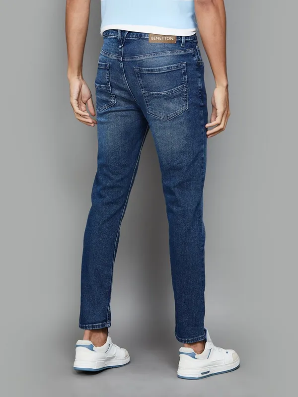UCB washed blue slim taper denim jeans