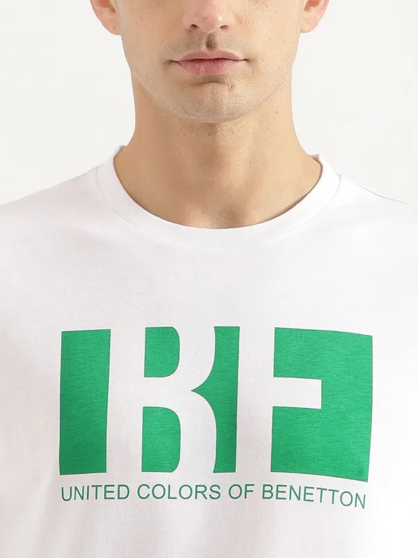 UCB white brand name cotton t-shirt