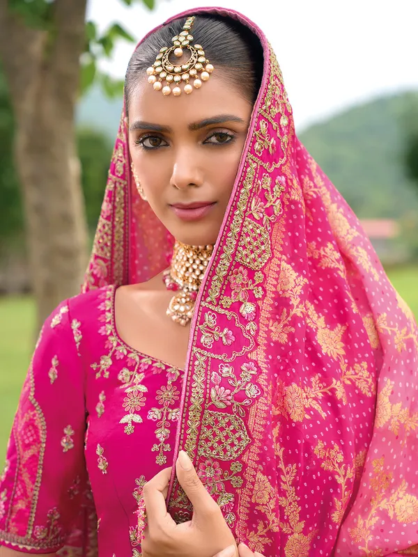 Unique rani color silk unstitched lehenga choli