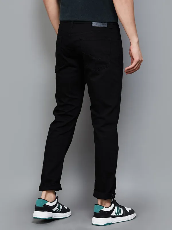 US POLO solid black slim tapered denim jeans for men